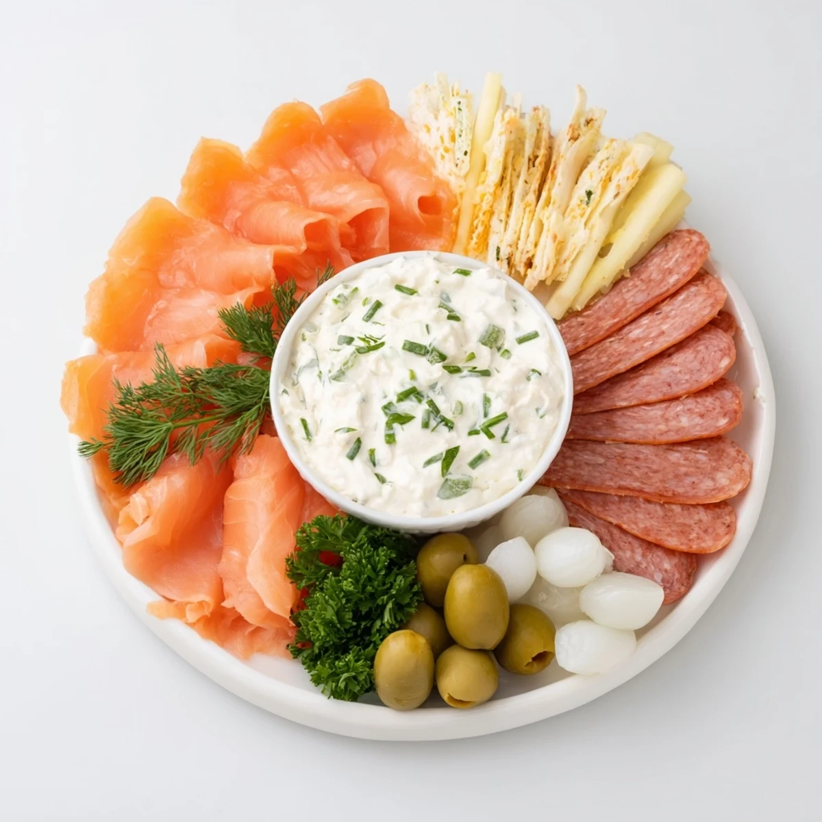 A The Compass Rose appetizer with vibrant meats radiating from a creamy dip, ready to be enjoyed.