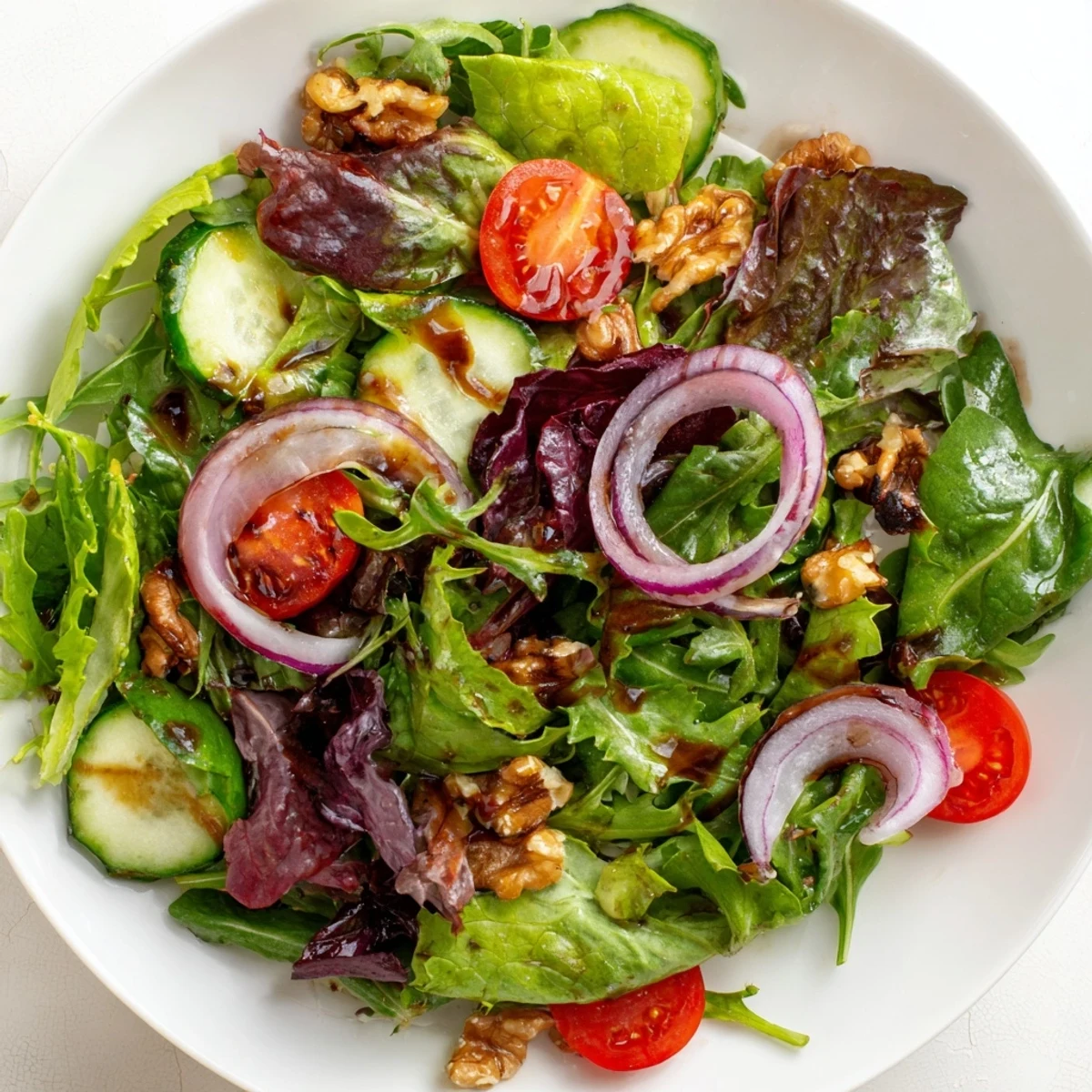 Enjoy a refreshing Quick Balsamic Vinegar Salad: mixed greens, tossed in a flavorful, simple dressing.
