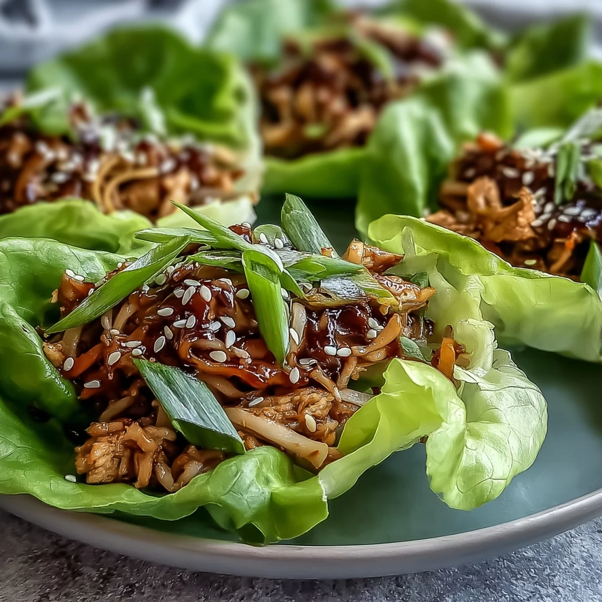 Potsticker Noodle Lettuce Cups with savory turkey and noodles in a crisp butter lettuce leaf.