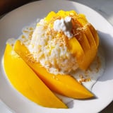 A vibrant photo shows creamy Thai mango sticky rice, perfect for a refreshing dessert served.