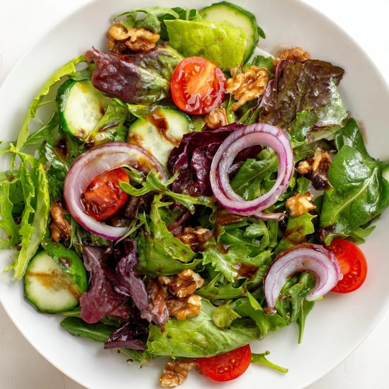 Enjoy a refreshing Quick Balsamic Vinegar Salad: mixed greens, tossed in a flavorful, simple dressing.